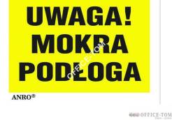 Naklejka samoprzylepna „Uwaga! Mokra podłoga”.